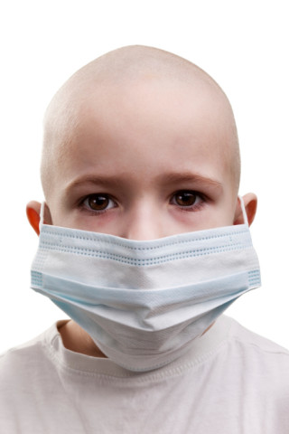 Child in medicine mask