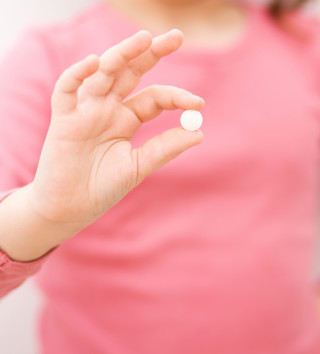 Hand with pills